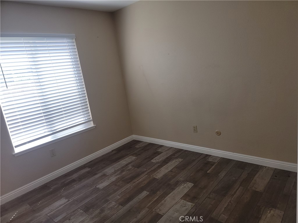 4464 Clarksdale Drive Riverside, CA 92505 - Photo 14 of 23 a view of an empty room with a window