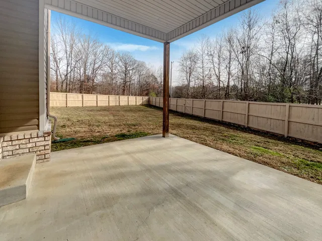 a picture of a bathroom with mirror