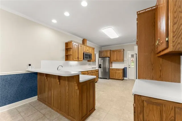 an empty room with a ceiling fan and a window