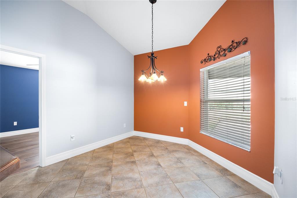 13413 Mandalay Place Spring Hill, FL 34609 - Photo 18 of 46 a view of a room with windows and entryway