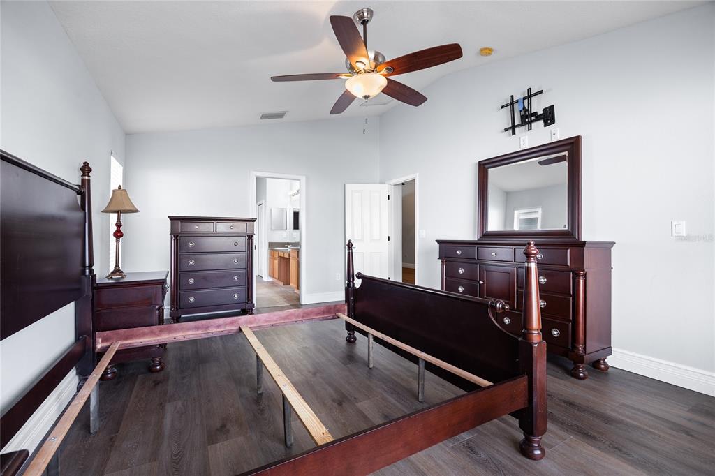 13413 Mandalay Place Spring Hill, FL 34609 - Photo 20 of 46 a living room with furniture and wooden floor