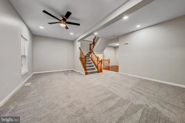 a view of a livingroom with a ceiling fan
