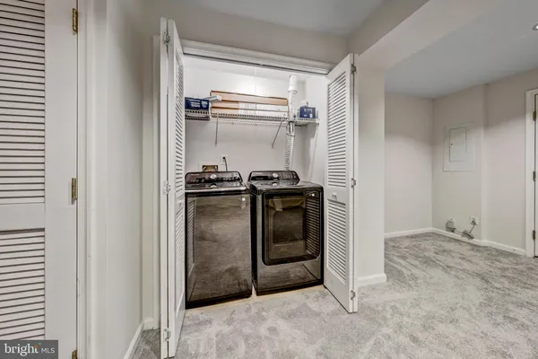 a view of a hallway with staircase