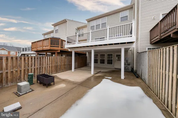 a view of balcony with wooden floor