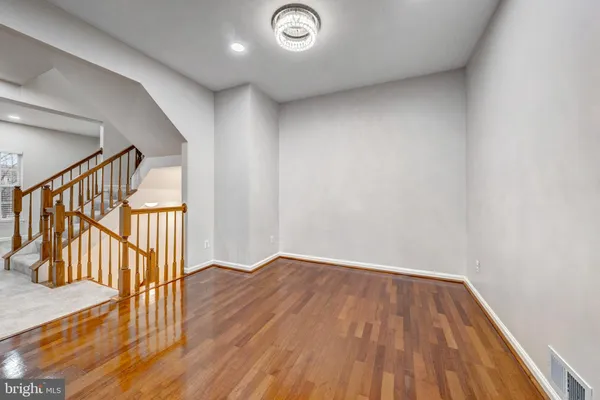 a view of entryway with wooden floor