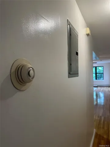 an empty room with a mirror