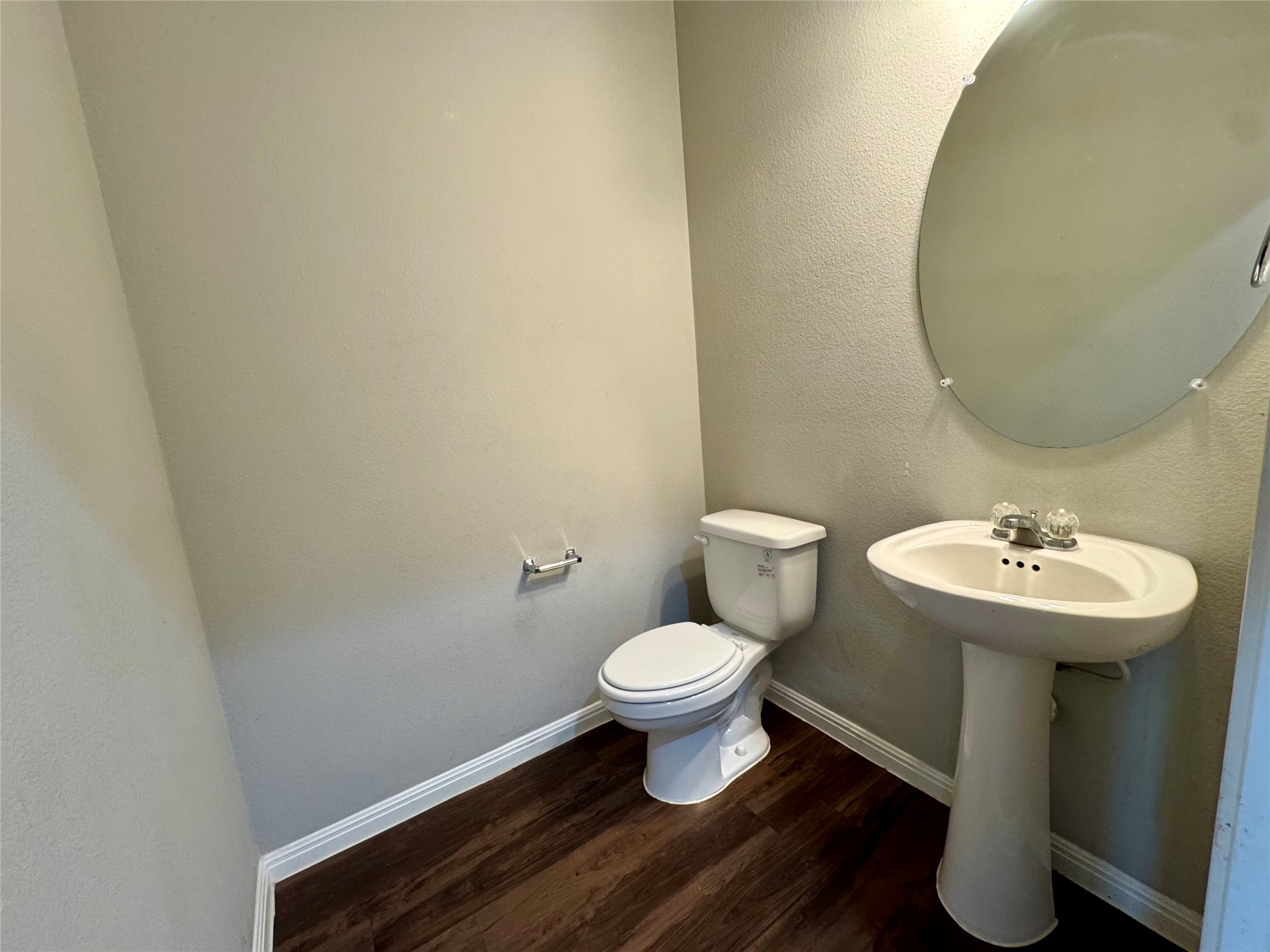 219 Wapiti Road Buda, TX 78610 - Photo 13 of 24 a bathroom with a sink and a mirror