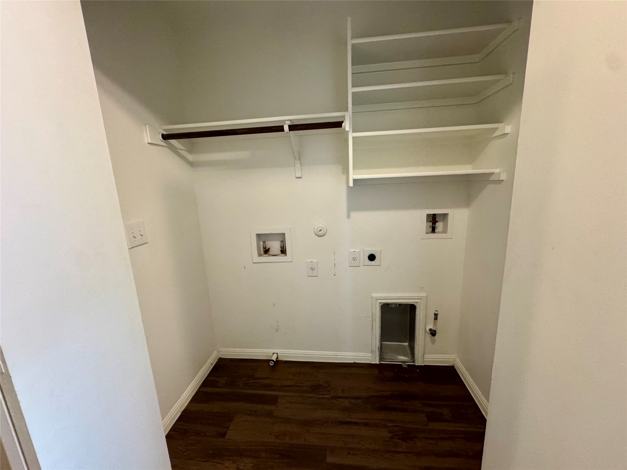 219 Wapiti Road Buda, TX 78610 - Photo 18 of 24 a view of a livingroom with wooden floor