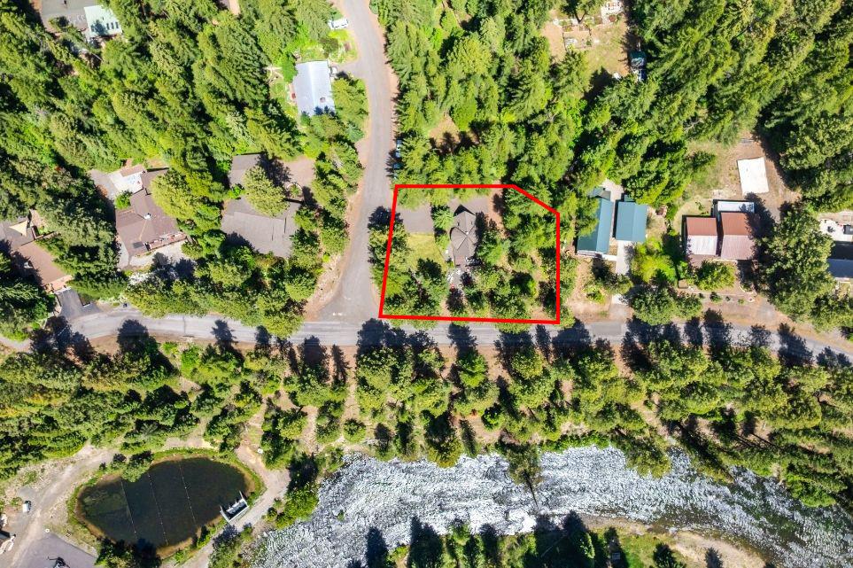 501 Gamble Road McCall, ID 83638 - Photo 2 of 28 Corner Lot on the Payette River, Across the street from the Payette River and in the heart of a quiet McCall residential neighborhood.