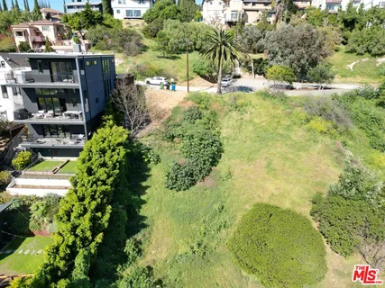 a view of swimming pool from a lake view