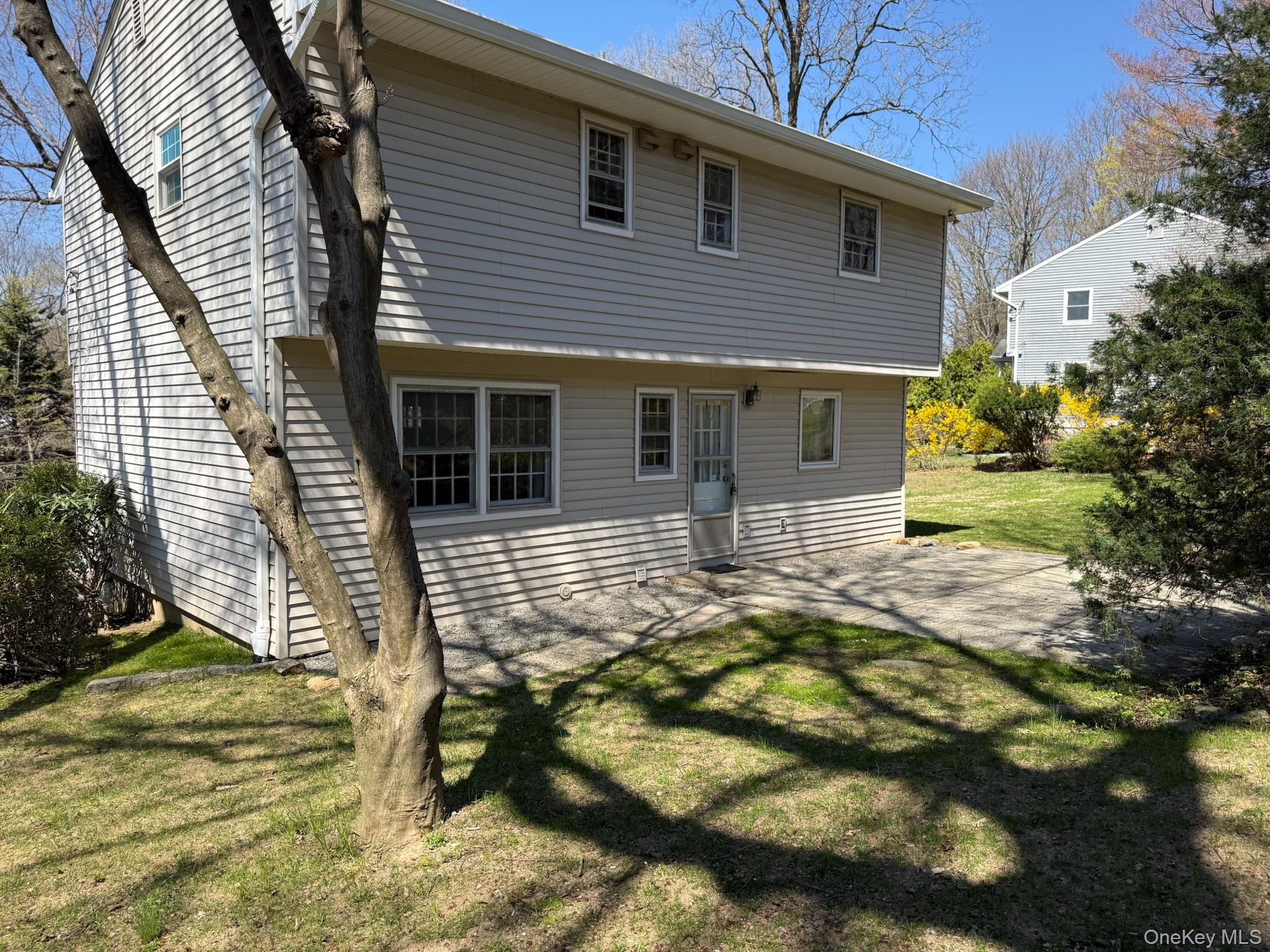 1131 Dobbs Ferry Road White Plains, NY 10607 - Photo 18 of 26 Rear of home with view of the anterior drainage.