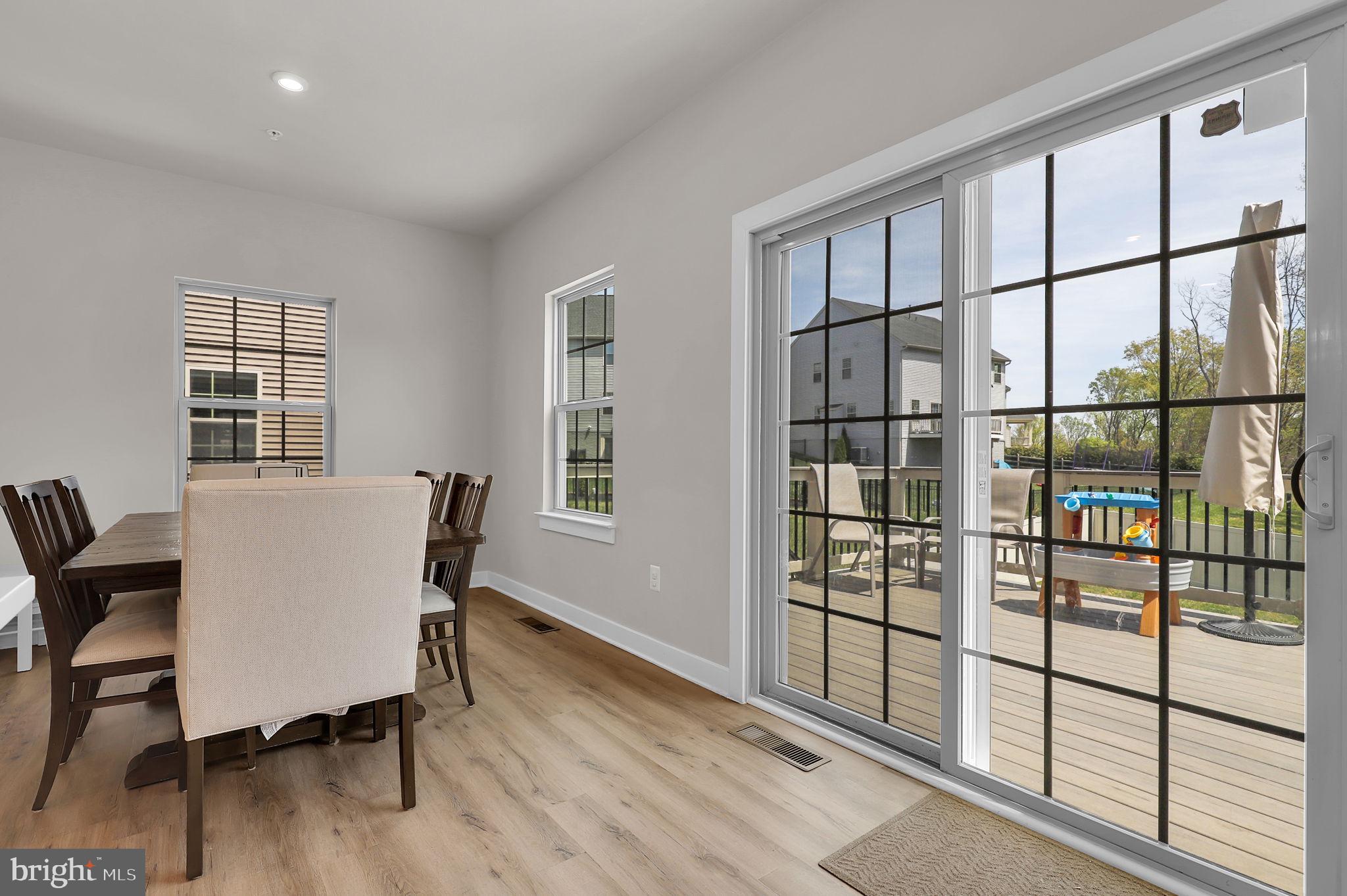 6919 Eaglehead Drive New Market, MD 21774 - Photo 17 of 59 a view of a workspace with furniture and a window
