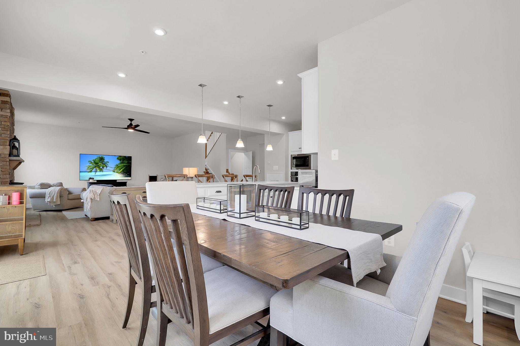6919 Eaglehead Drive New Market, MD 21774 - Photo 19 of 59 a view of a dining room with furniture