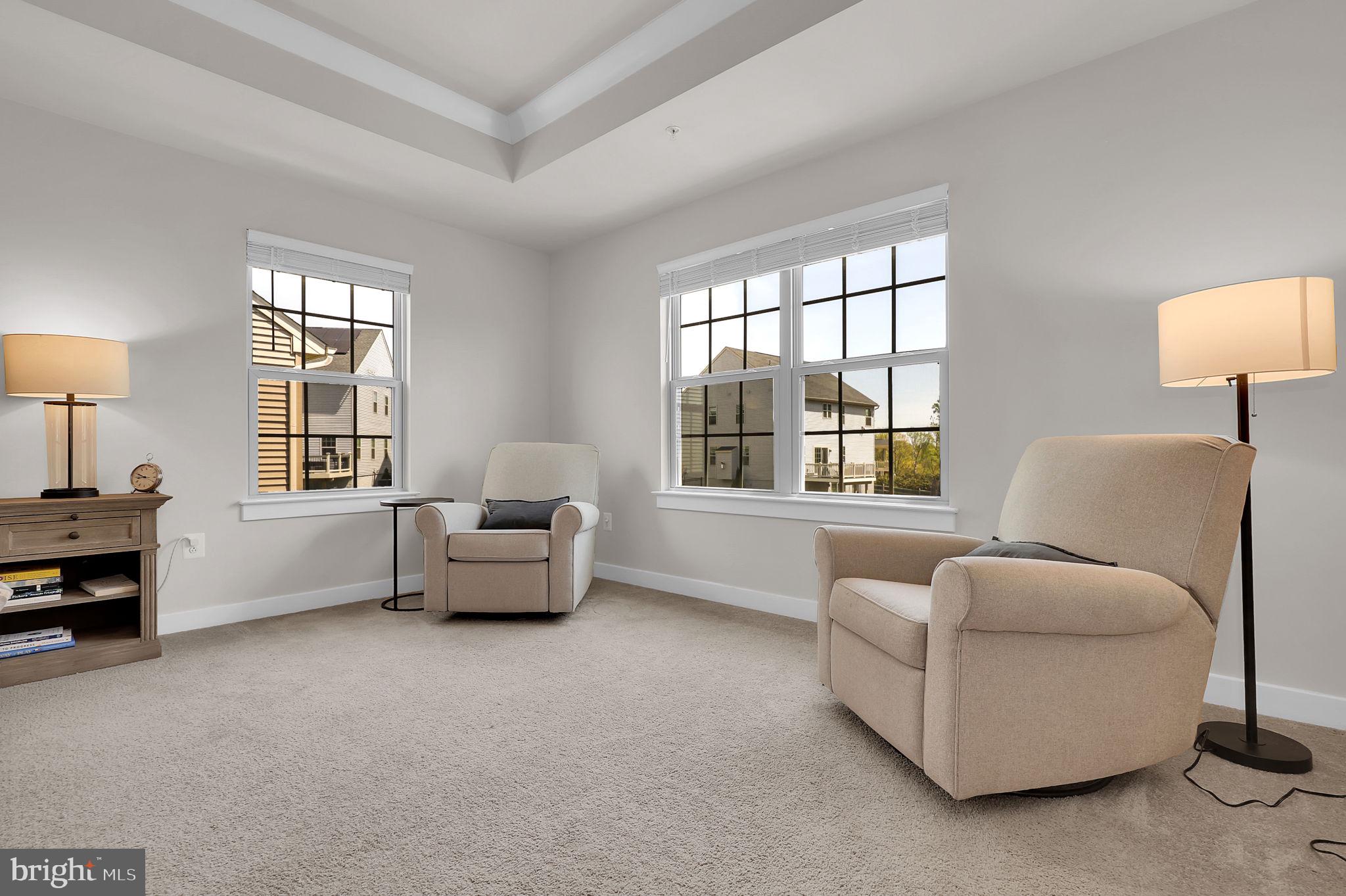 6919 Eaglehead Drive New Market, MD 21774 - Photo 22 of 59 a living room with furniture and a window