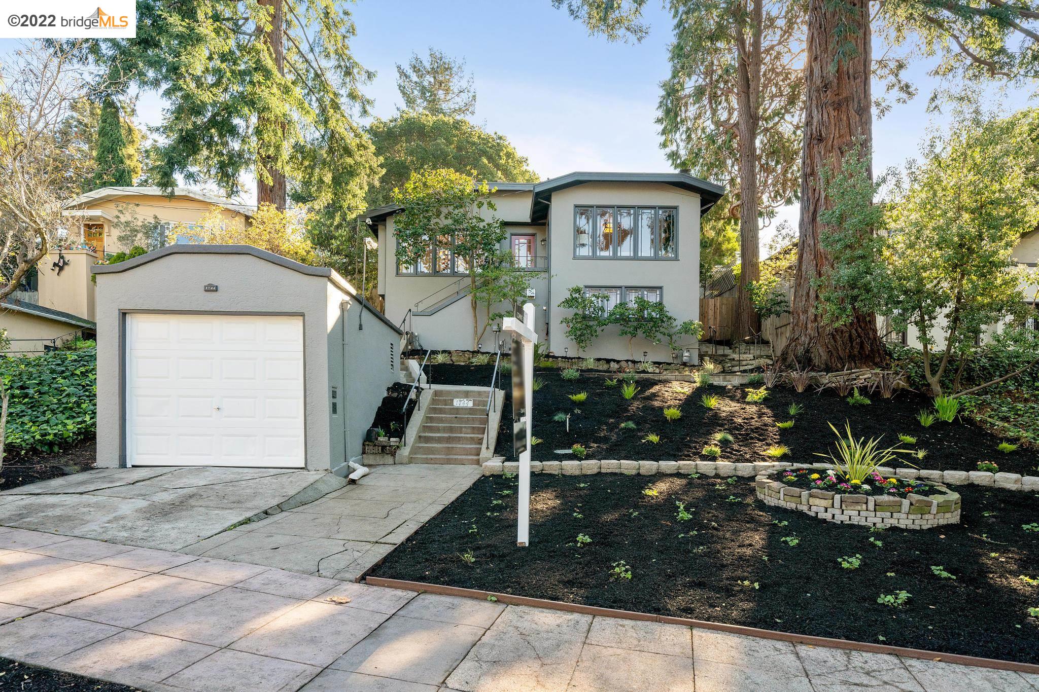 1744 Marin Avenue Berkeley, CA 94707 - Photo 1 of 1 a front view of a house with garden
