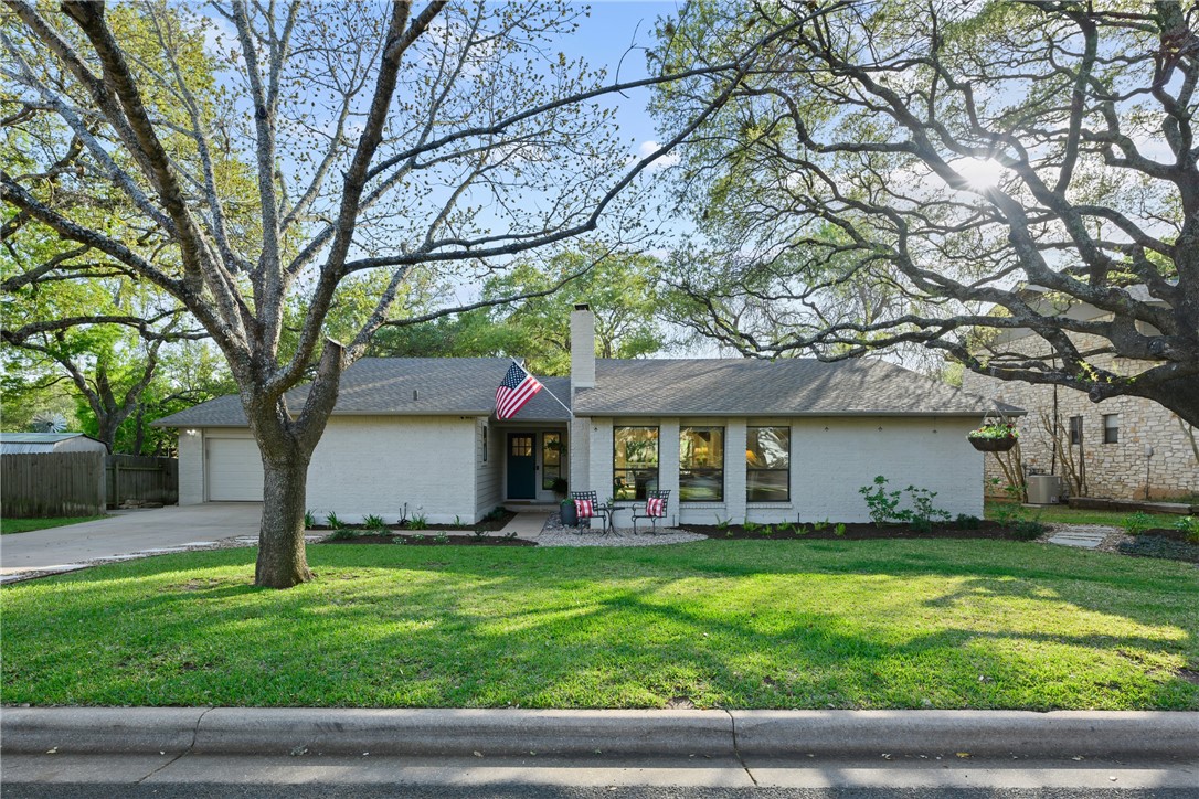 a house view with garden space