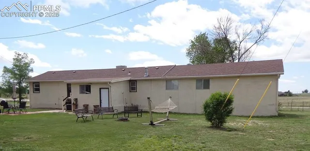 a swimming pool view with a outdoor space