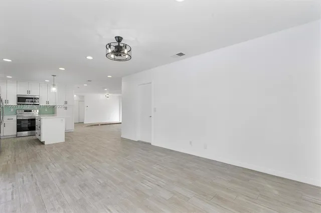 a view of kitchen with a sink