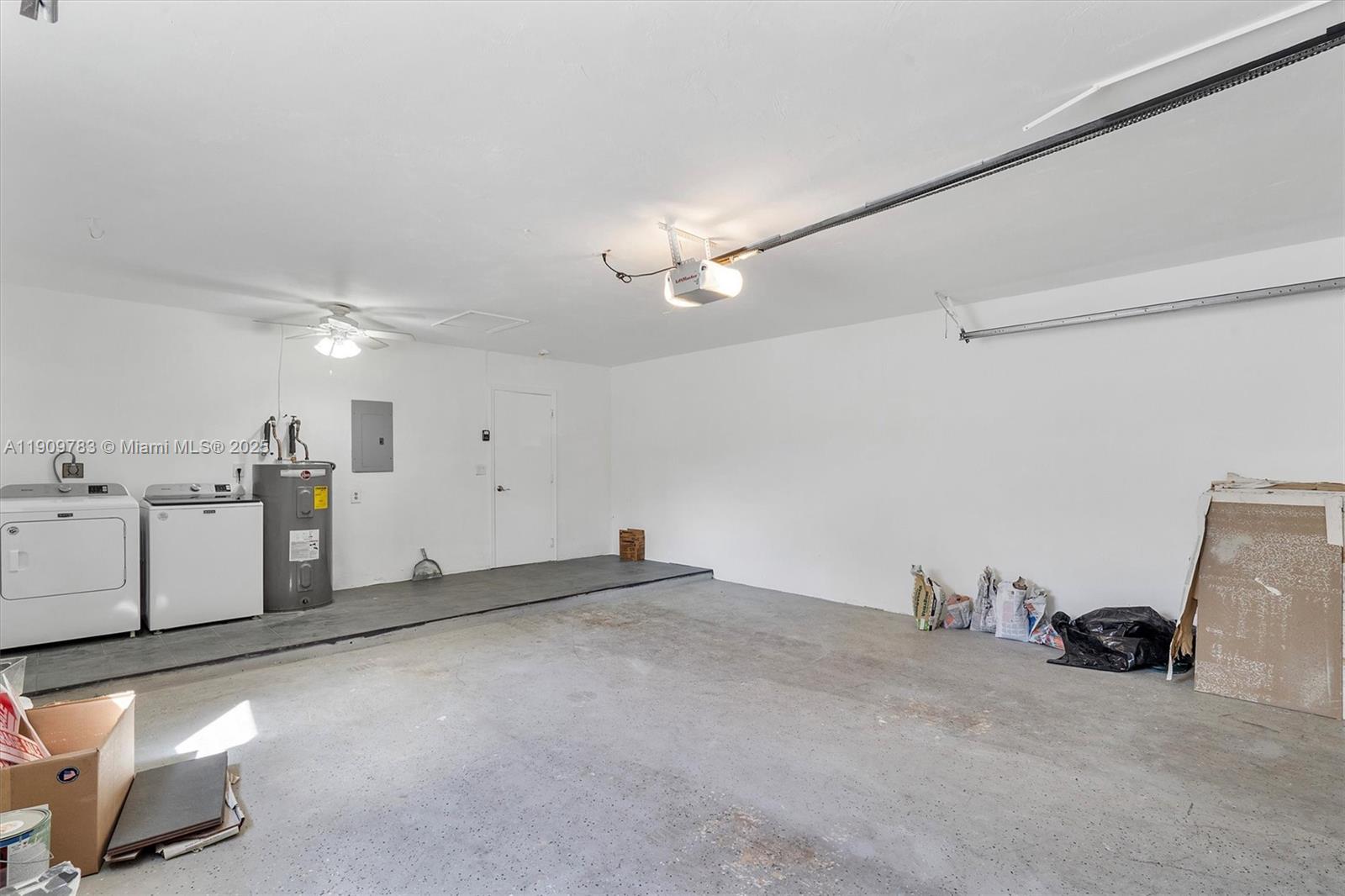 4309 Jackson Street Hollywood, FL 33021 - Photo 18 of 39 a view of a storage & utility room with two washing machine