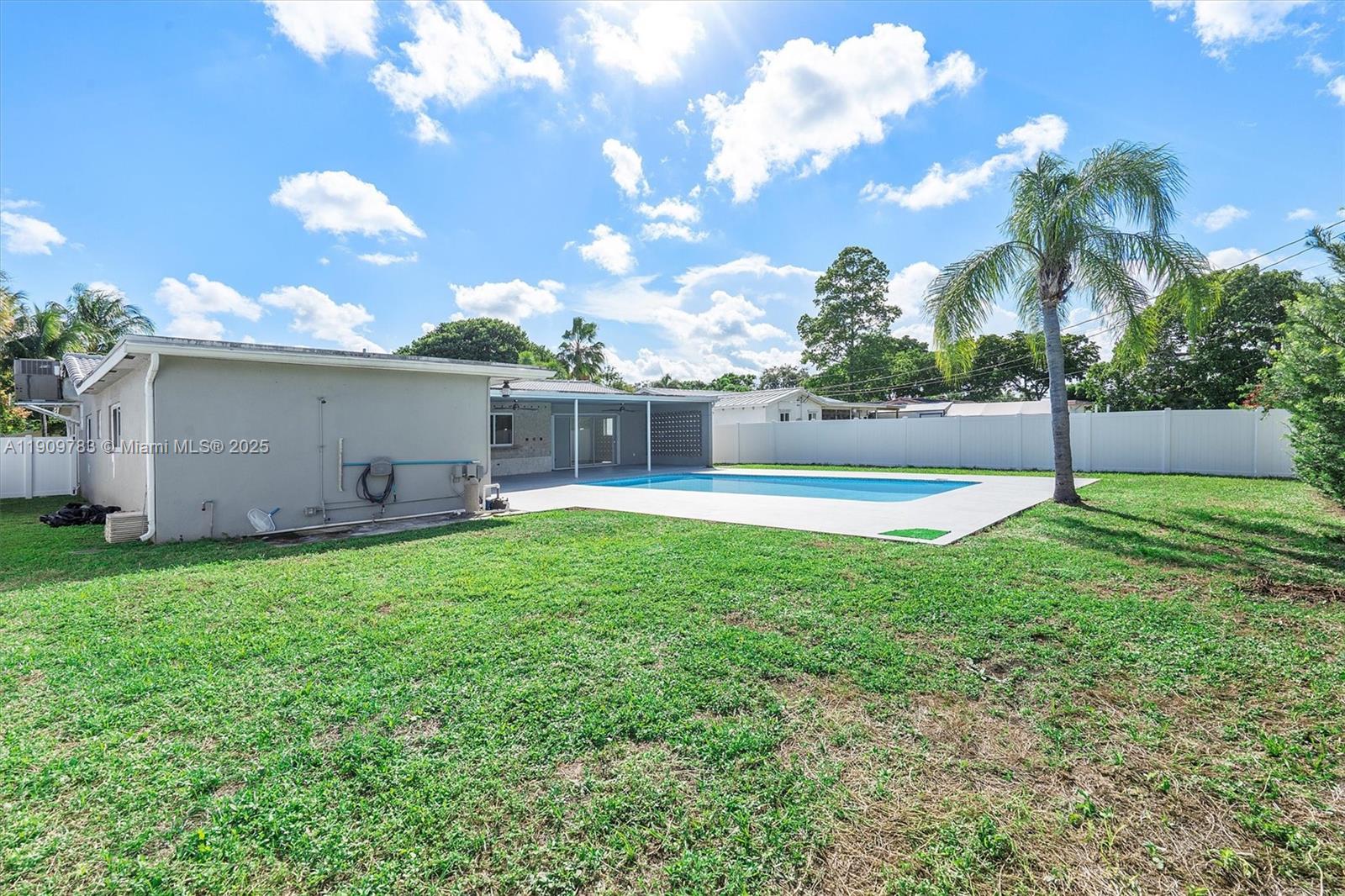 4309 Jackson Street Hollywood, FL 33021 - Photo 36 of 39 a view of a backyard with a garden and plants