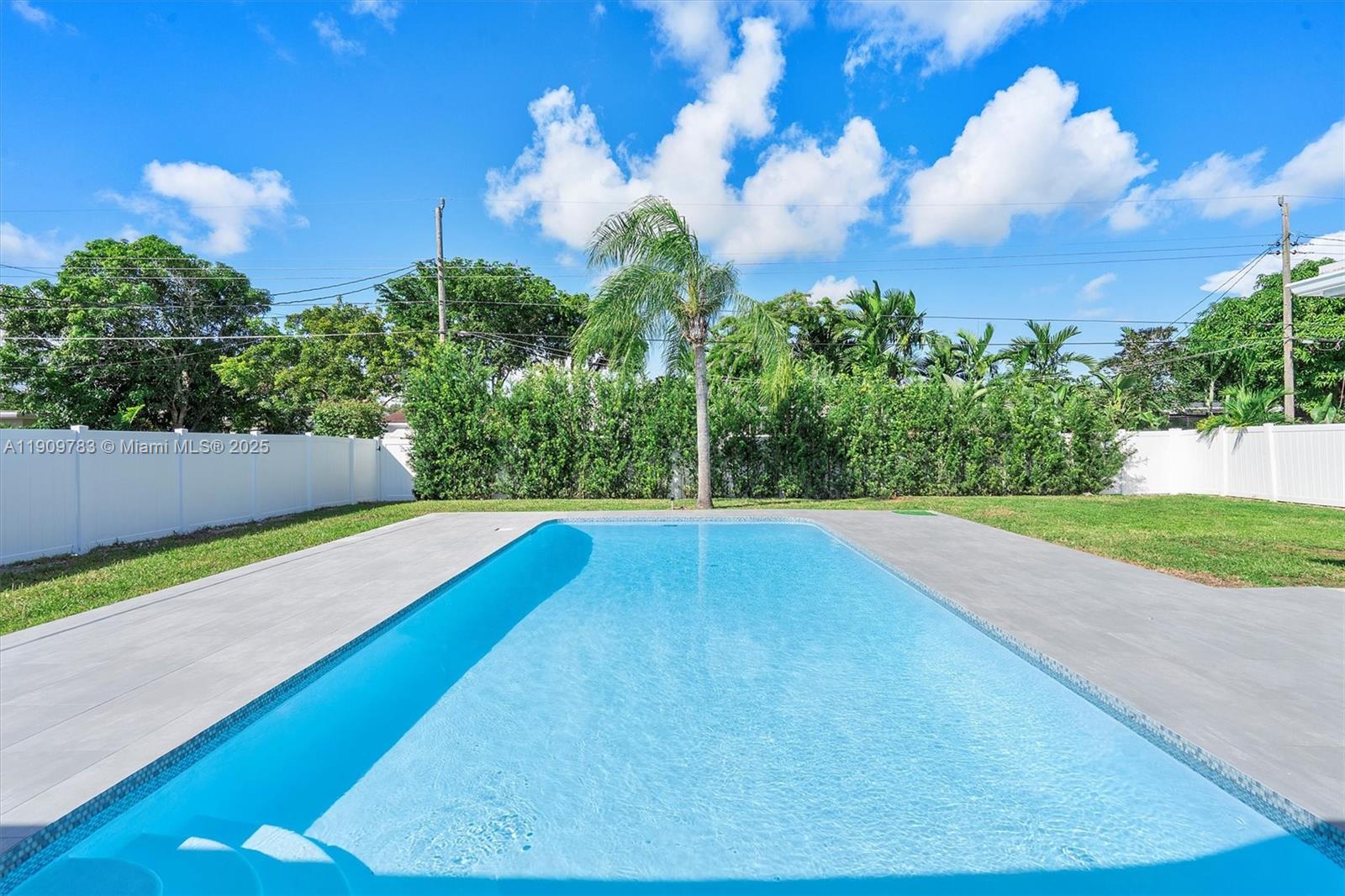 4309 Jackson Street Hollywood, FL 33021 - Photo 39 of 39 a view of a yard with a house