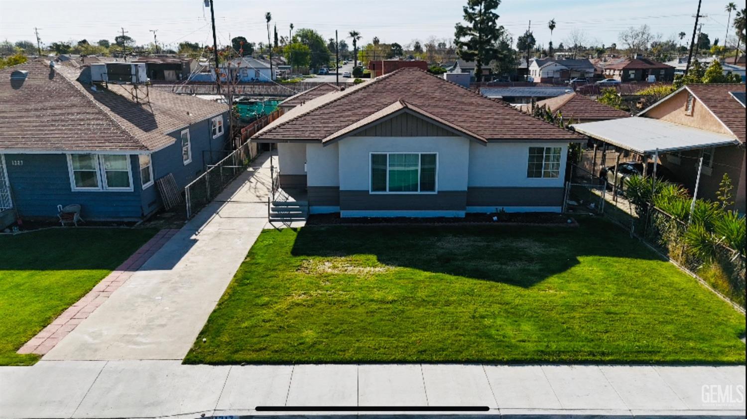 Undisclosed Address Bakersfield, CA 93304 - Photo 1 of 26 a backyard of a house with table and chairs