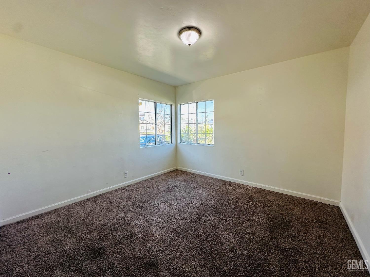 Undisclosed Address Bakersfield, CA 93304 - Photo 25 of 26 an empty room with windows