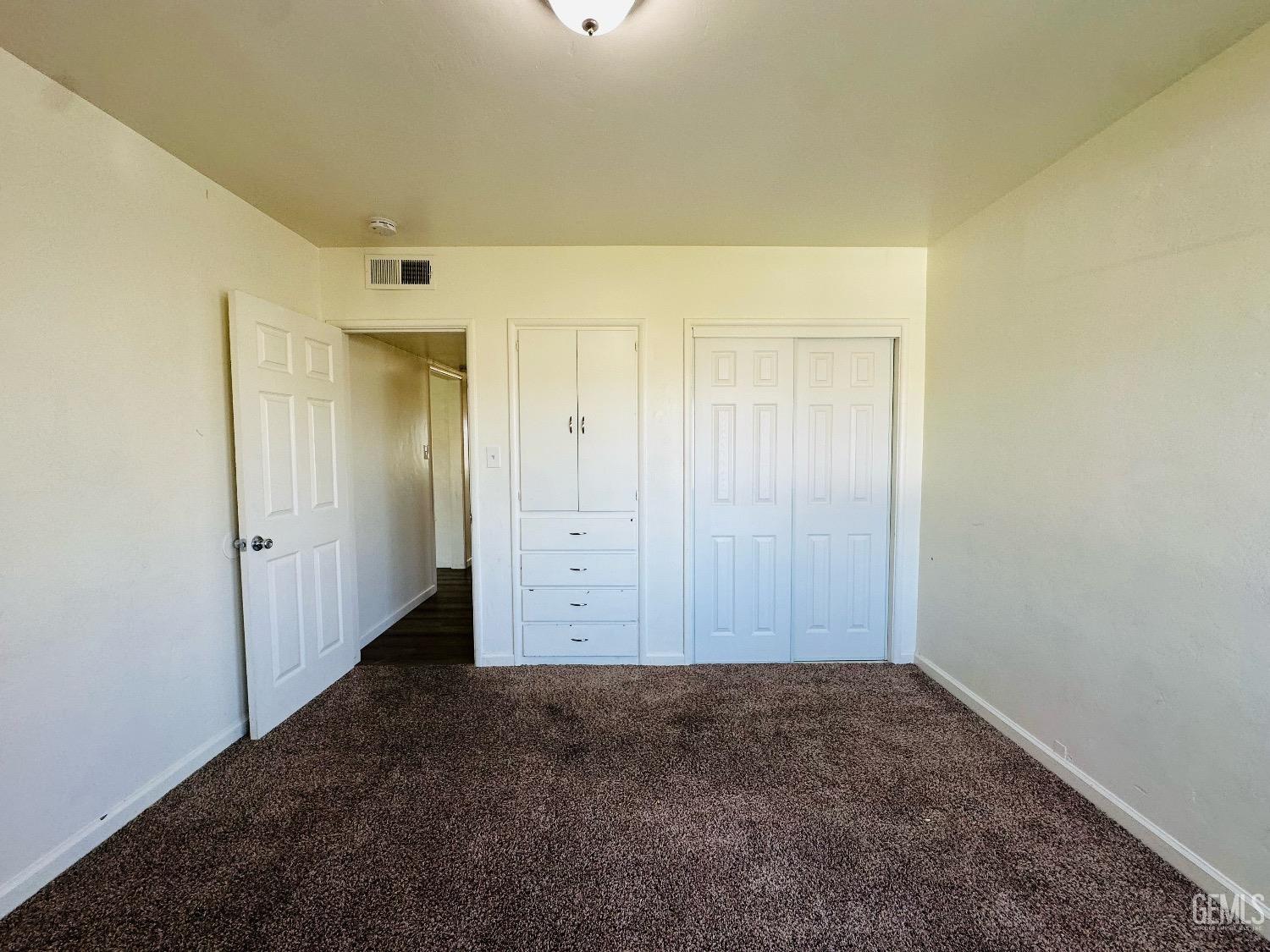 Undisclosed Address Bakersfield, CA 93304 - Photo 26 of 26 an empty room with closet area