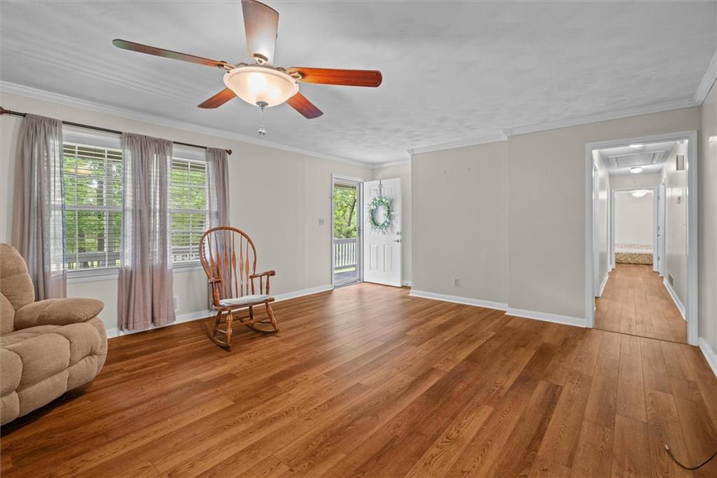 1267 Austin Bridge Road Douglasville, GA 30134 - Photo 11 of 66 a view of a livingroom with furniture and a ceiling fan
