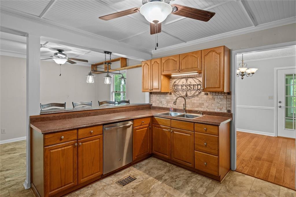 1267 Austin Bridge Road Douglasville, GA 30134 - Photo 19 of 66 a spacious bathroom with a granite countertop sink and a mirror