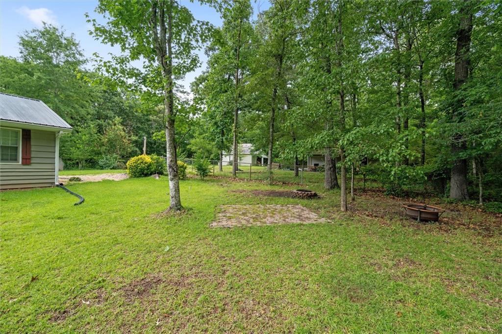 1267 Austin Bridge Road Douglasville, GA 30134 - Photo 34 of 66 a view of a tree in a park