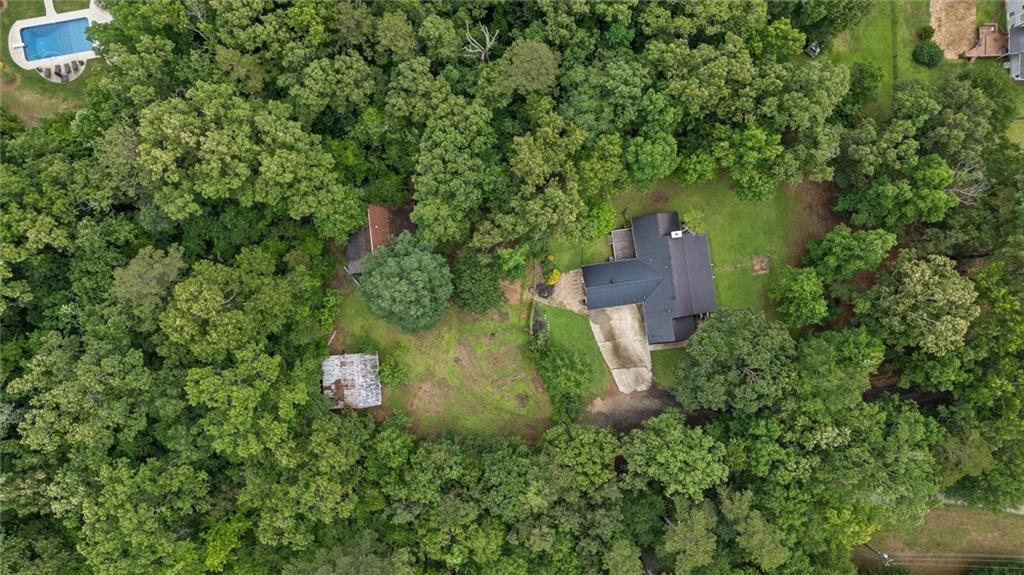 1267 Austin Bridge Road Douglasville, GA 30134 - Photo 43 of 66 an aerial view of a house with a yard