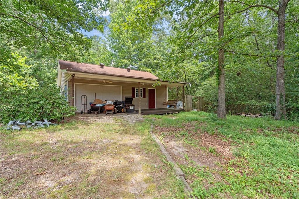 1267 Austin Bridge Road Douglasville, GA 30134 - Photo 48 of 66 a view of outdoor space yard and deck