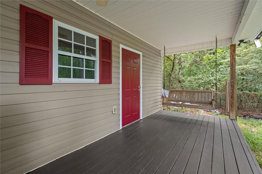 1267 Austin Bridge Road Douglasville, GA 30134 - Photo 50 of 66 a view of a deck with wooden floor and outdoor space