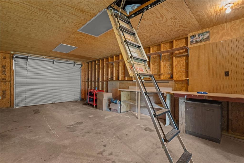 1267 Austin Bridge Road Douglasville, GA 30134 - Photo 51 of 66 a view of a room with gym equipment