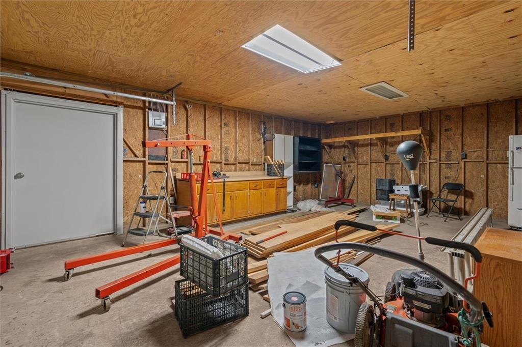 1267 Austin Bridge Road Douglasville, GA 30134 - Photo 54 of 66 a view of a room with gym equipment