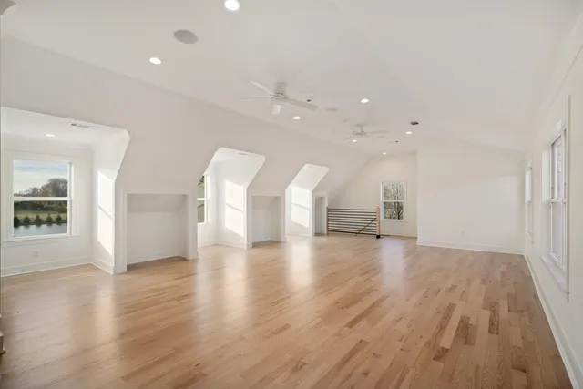 a view of a house with basketball court