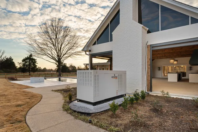 a kitchen with stainless steel appliances granite countertop a sink and wooden cabinets