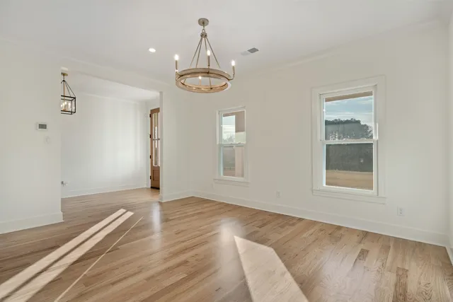 a kitchen with a sink stove and refrigerator