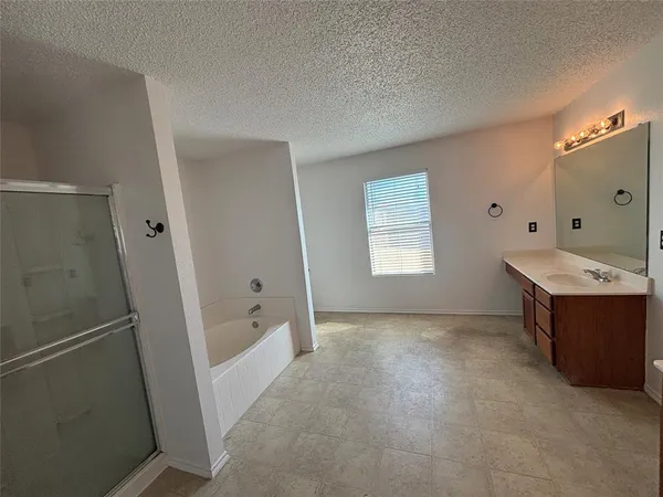a view of room with a sink and mirror