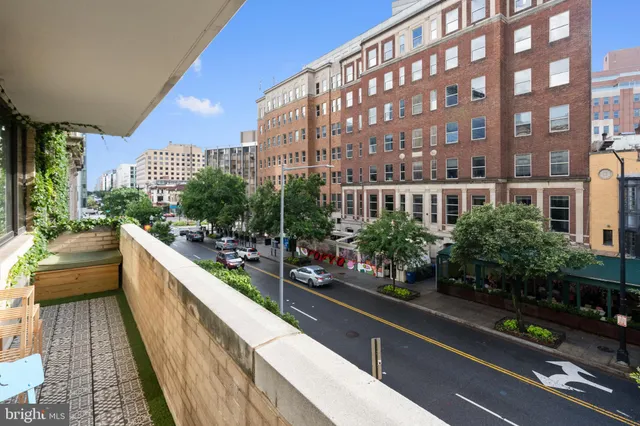 a view of balcony with a potted plant
