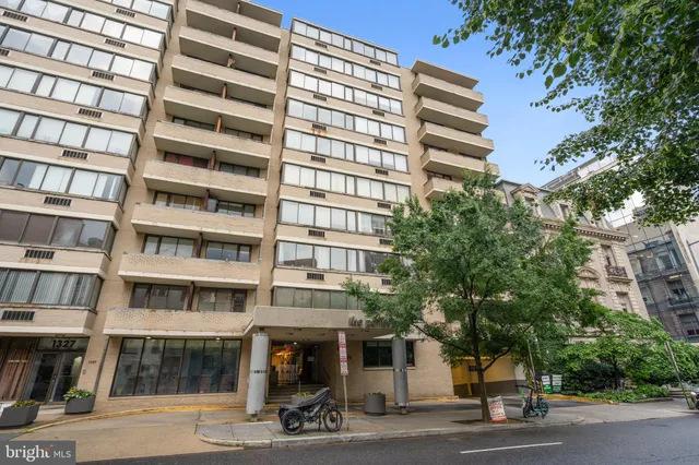 a view of a building with a street