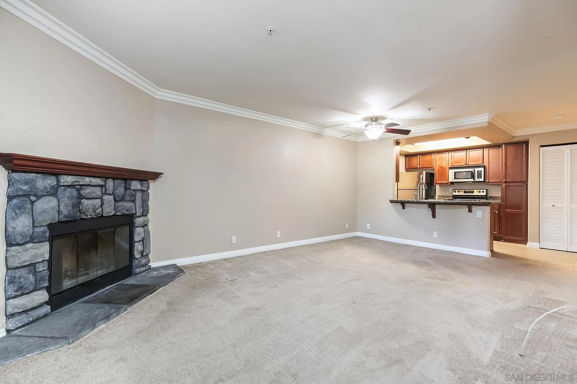 1434 Marshall Road, Unit 56 Alpine, CA 91901 - Photo 4 of 14 a view of a livingroom with a fireplace