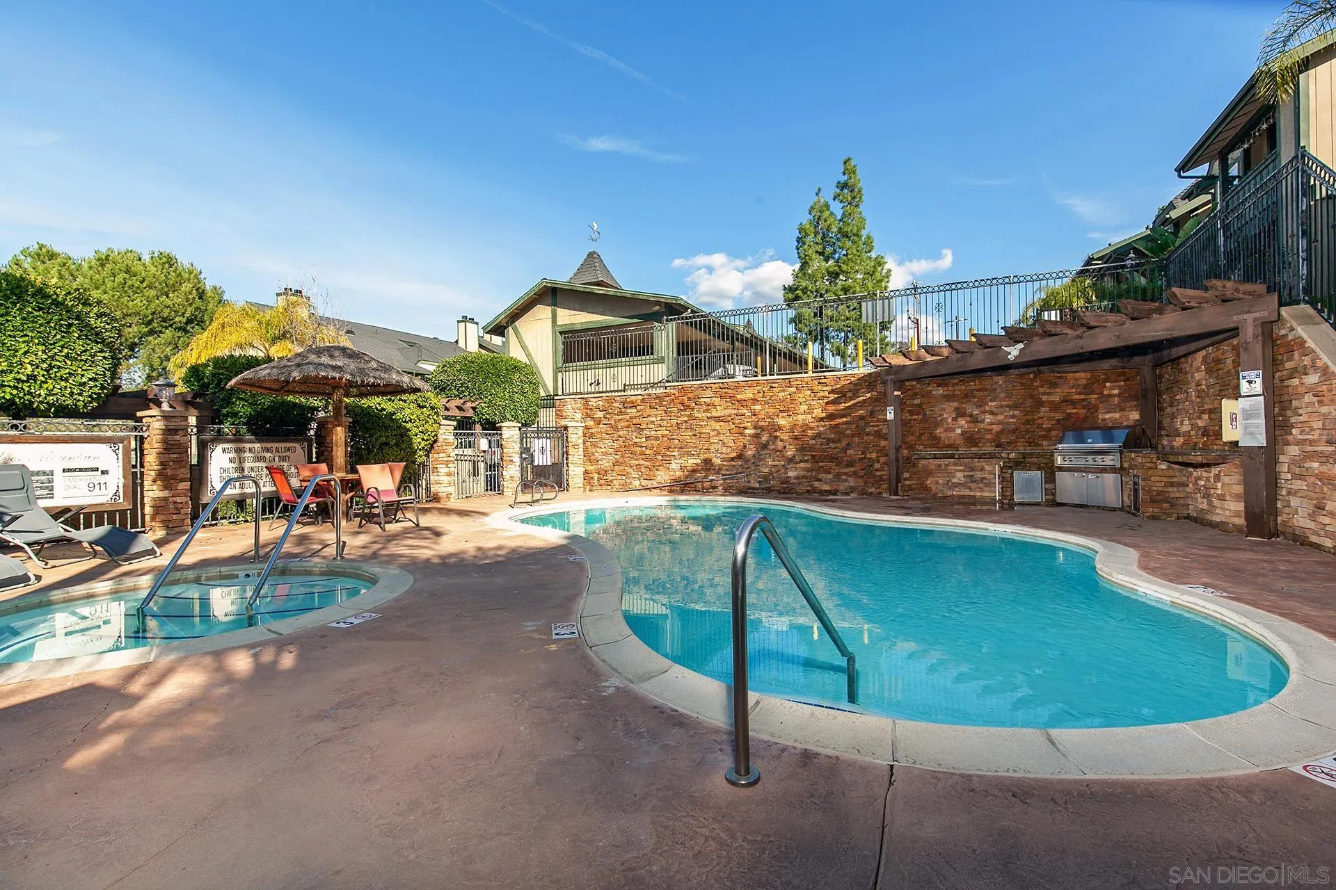 1434 Marshall Road, Unit 56 Alpine, CA 91901 - Photo 10 of 14 a view of a house with swimming pool and sitting area
