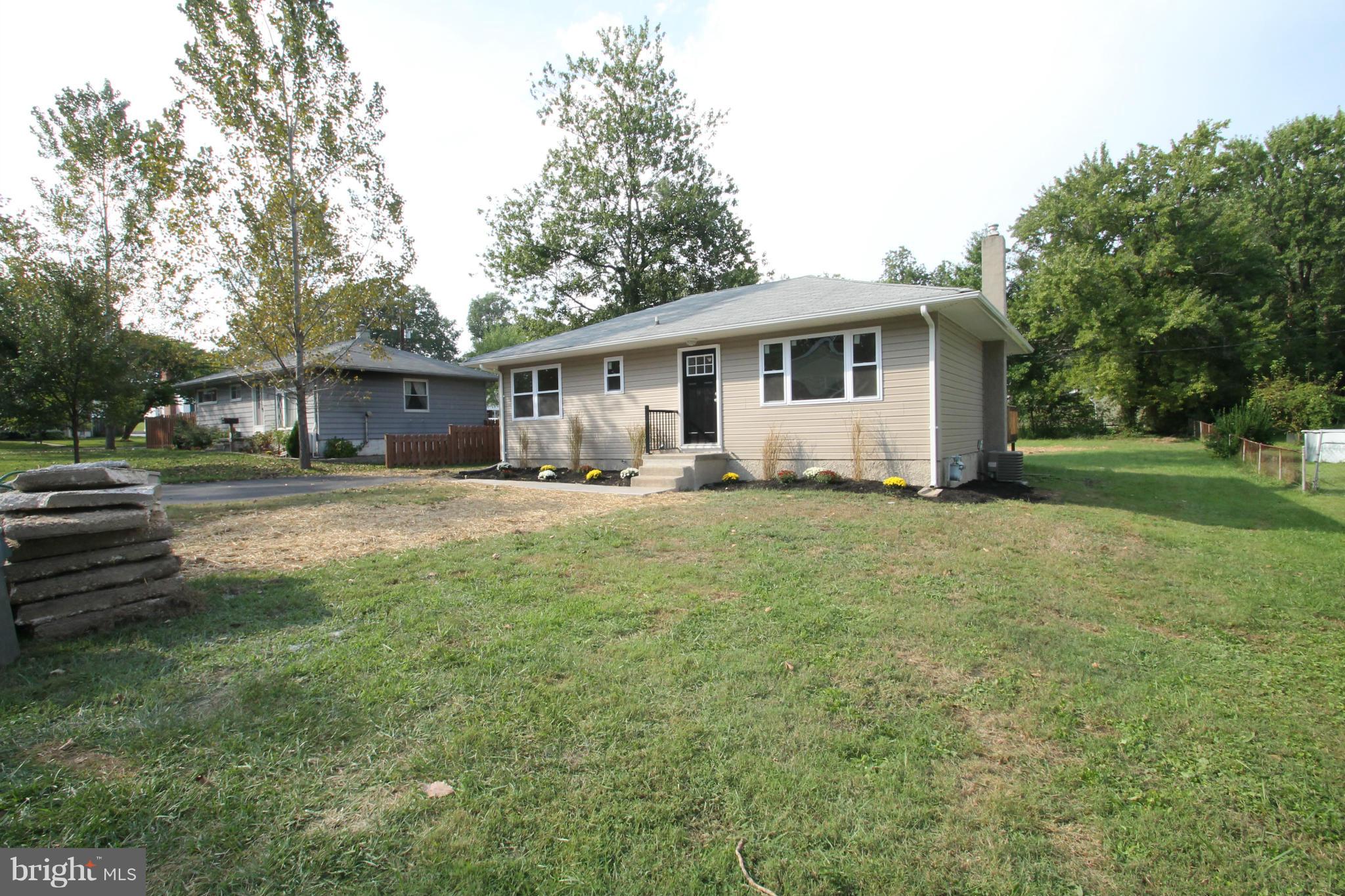 1520 Daytona Road Baltimore, MD 21234 - Photo 3 of 24 a front view of a house with garden