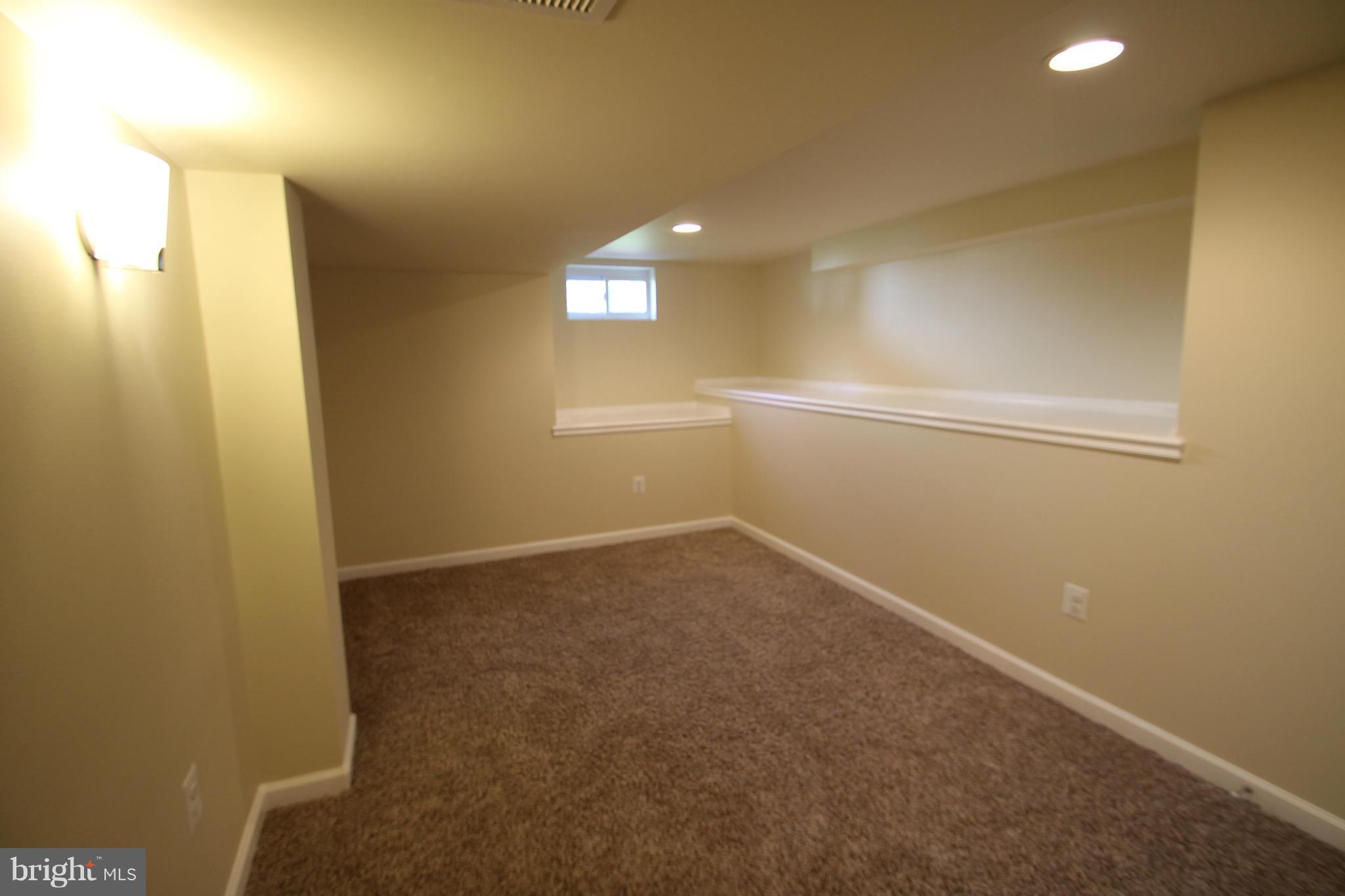 1520 Daytona Road Baltimore, MD 21234 - Photo 22 of 24 a view of an empty room with a window