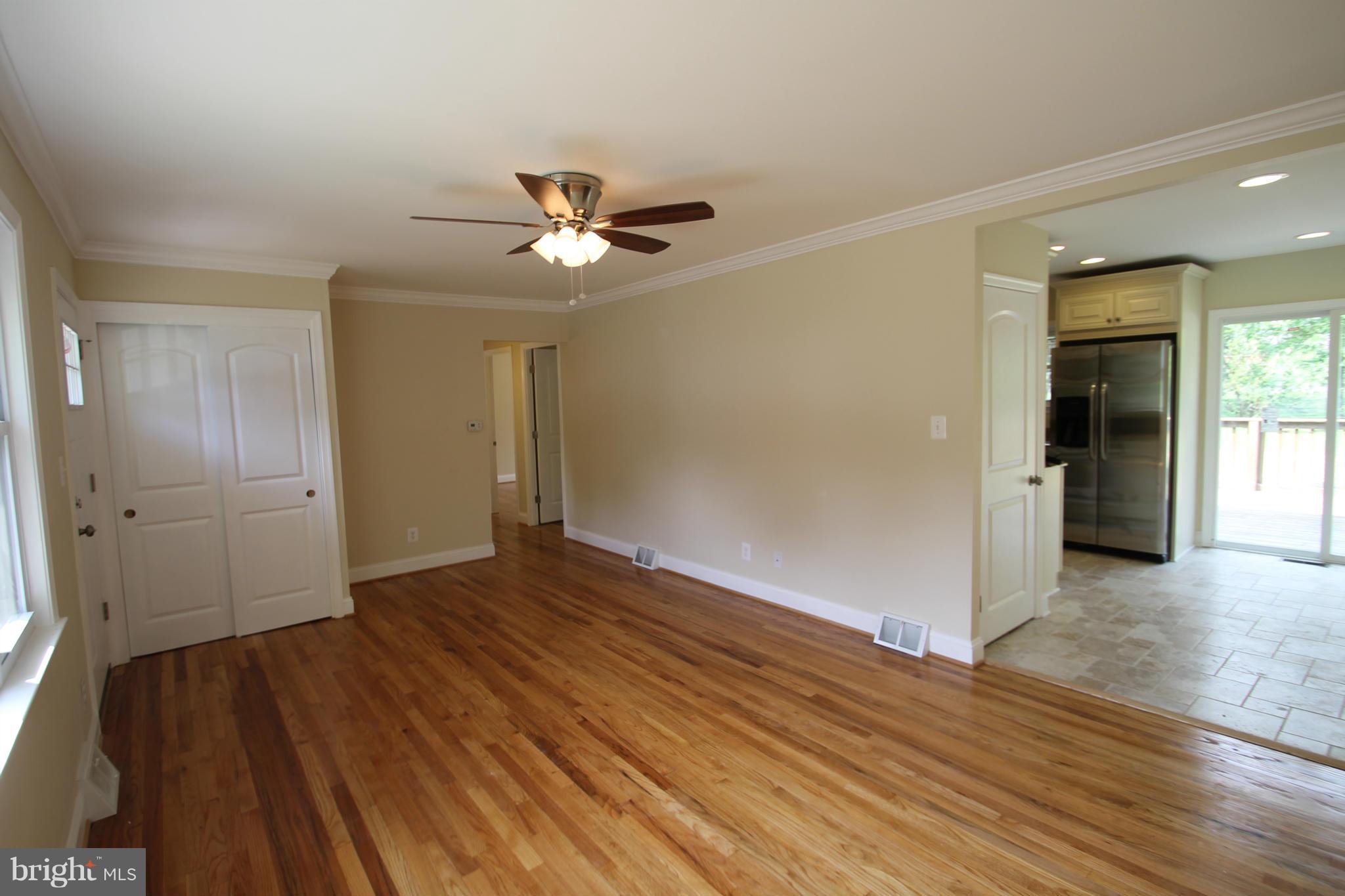1520 Daytona Road Baltimore, MD 21234 - Photo 7 of 24 wooden floor in an empty room with a window