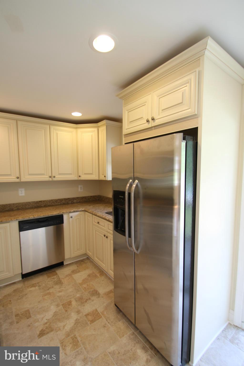1520 Daytona Road Baltimore, MD 21234 - Photo 10 of 24 a kitchen with stainless steel appliances granite countertop a refrigerator and a stove