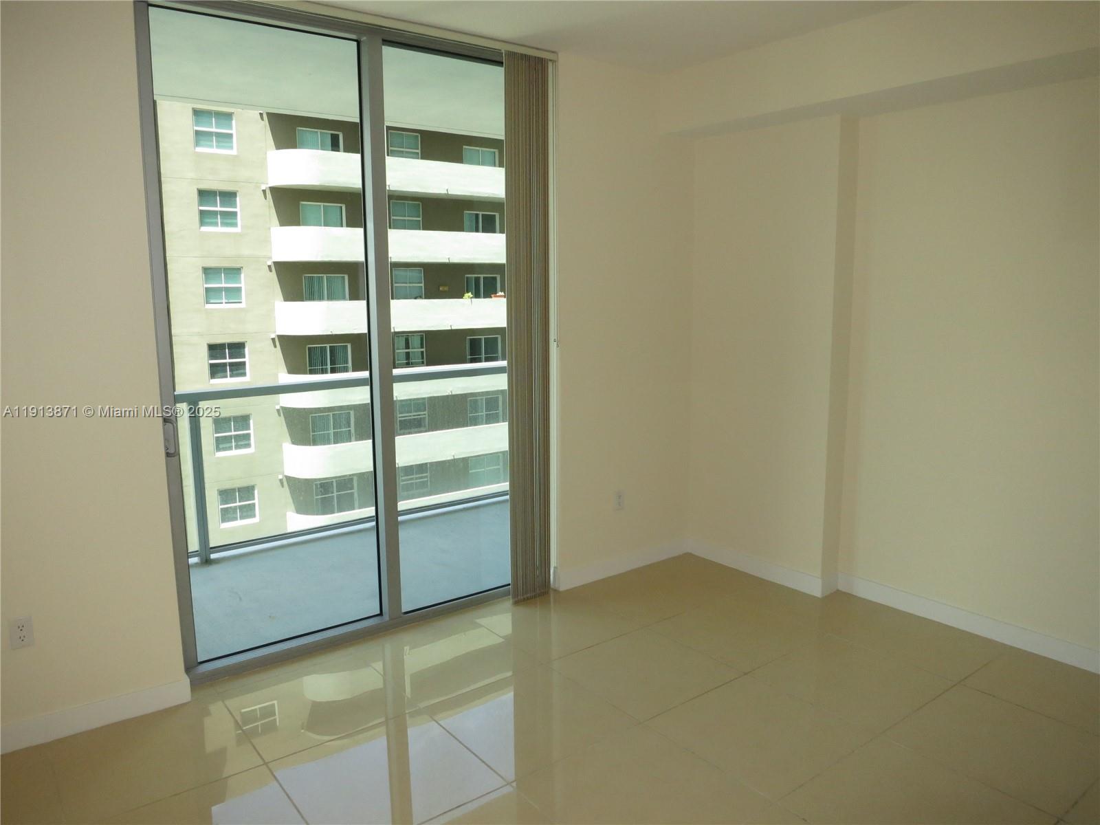 1111 Southwest 1st Avenue, Unit 1024N Miami, FL 33130 - Photo 9 of 12 a view of an empty room