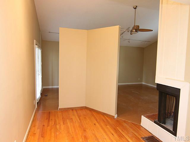 3479 Hope Valley Road Durham, NC 27707 - Photo 8 of 21 a view of an empty room with wooden floor